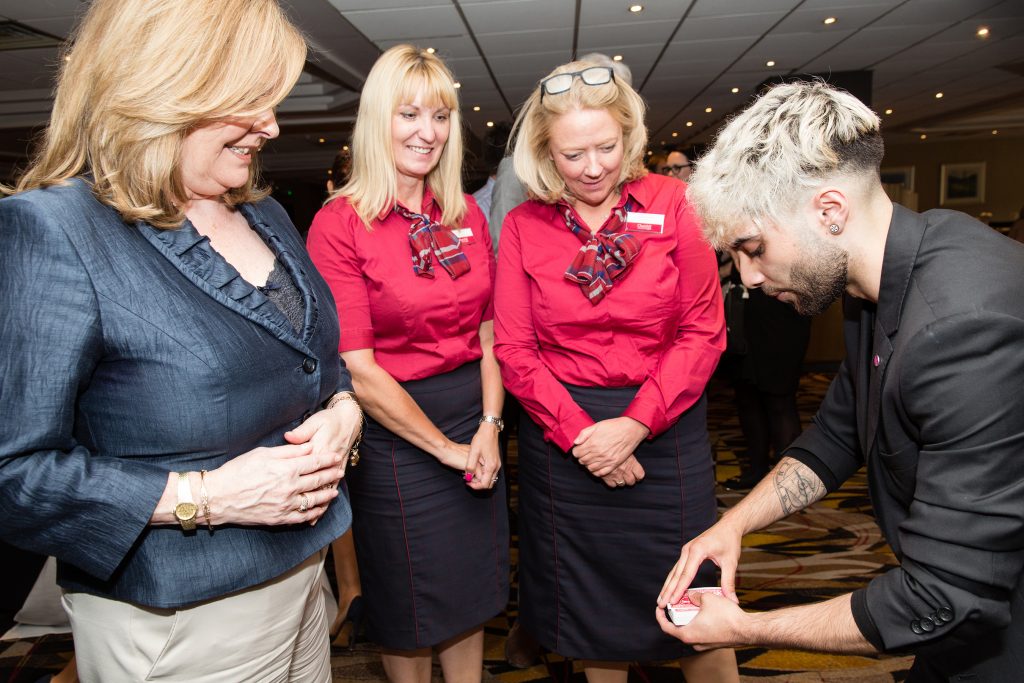 Close up magician performing Marketing Conference @ The Hampshire Court Hotel.